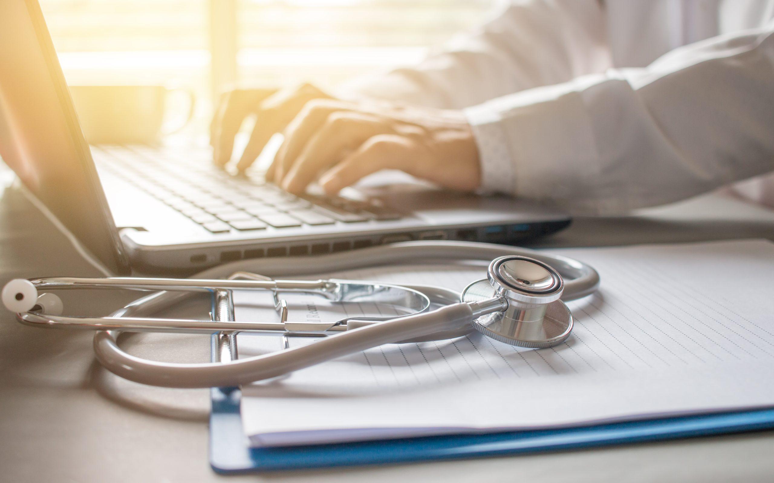 Doctor working an Laptop