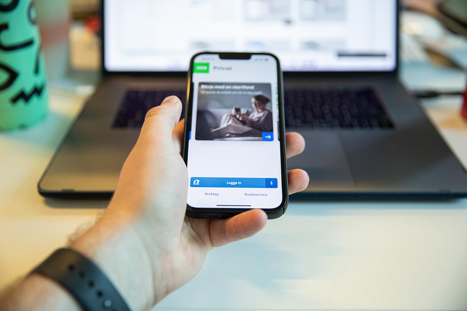 man holding a phone in his hand